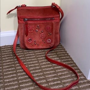 Red fossil purse